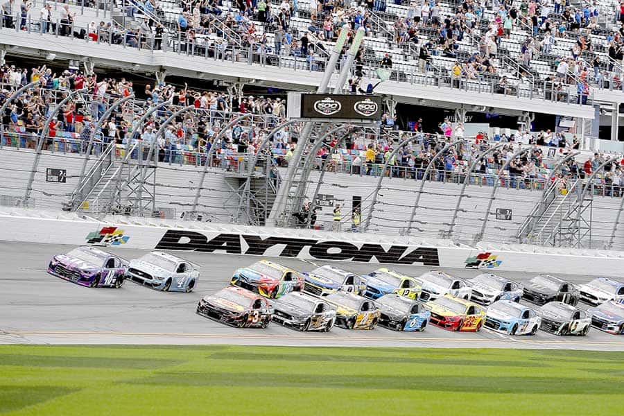 Race cars line up for start of NASCAR race at Daytona Speedway