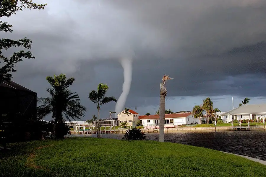 Waterspout behind residential area