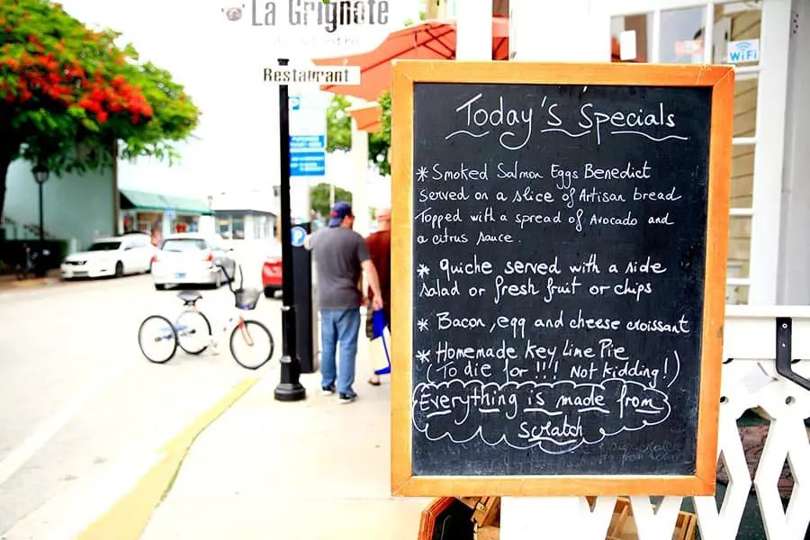 Menu on sidewalk in of restaurant