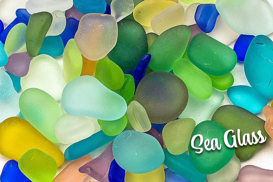 Broken bottles & glass turned into smooth sea glass by the churning of the ocean