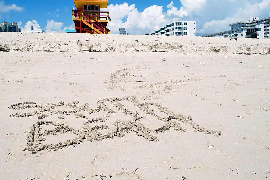 South Beach written in the beach sand