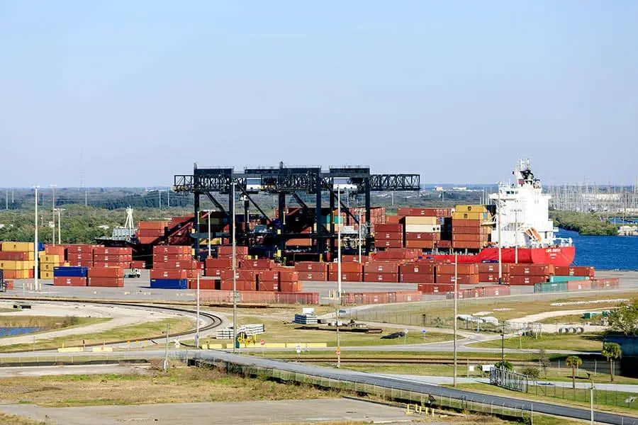 Containers being unloaded and stacked at Port Tampa Bay