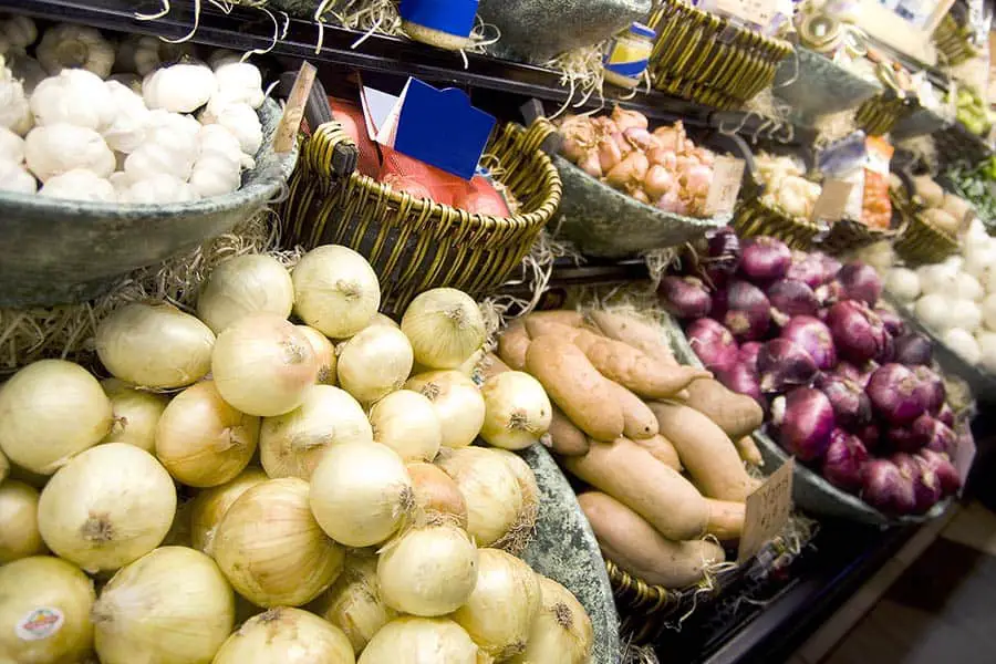 Baskets of produce on display in grocery store