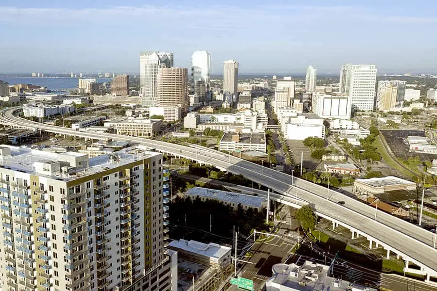 Aerial view of city apartment buildings and highway