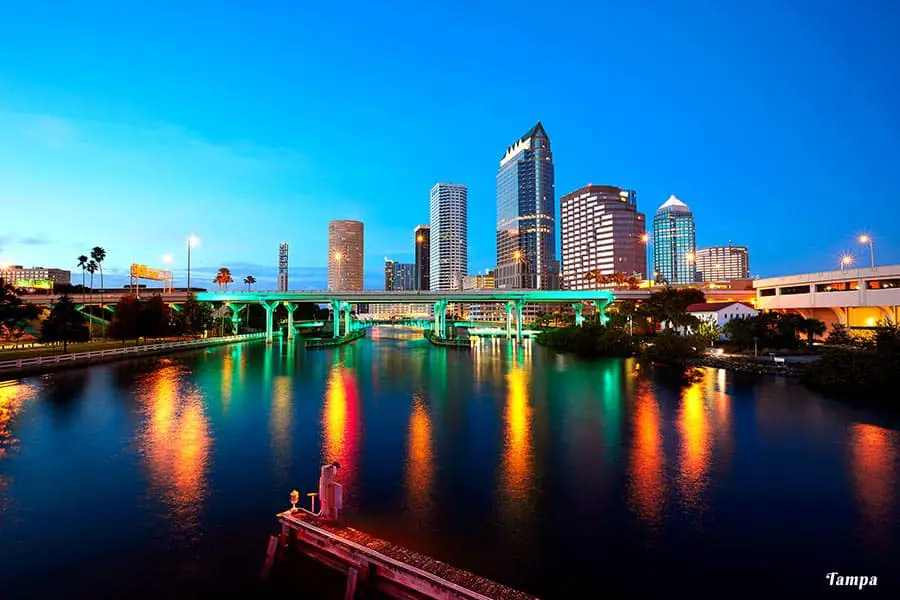 Tampa at dusk with city lights reflecting off water